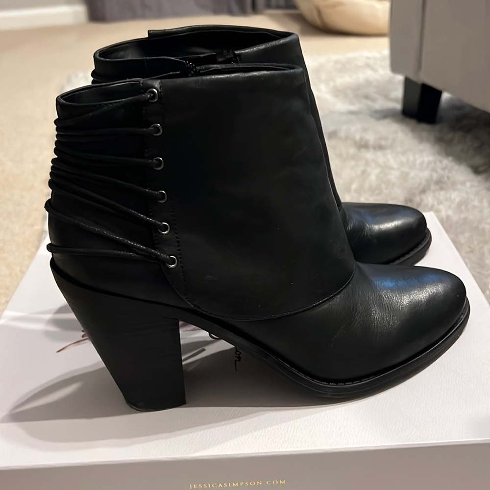 Black booties with side zipper. Like new, worn a few times
